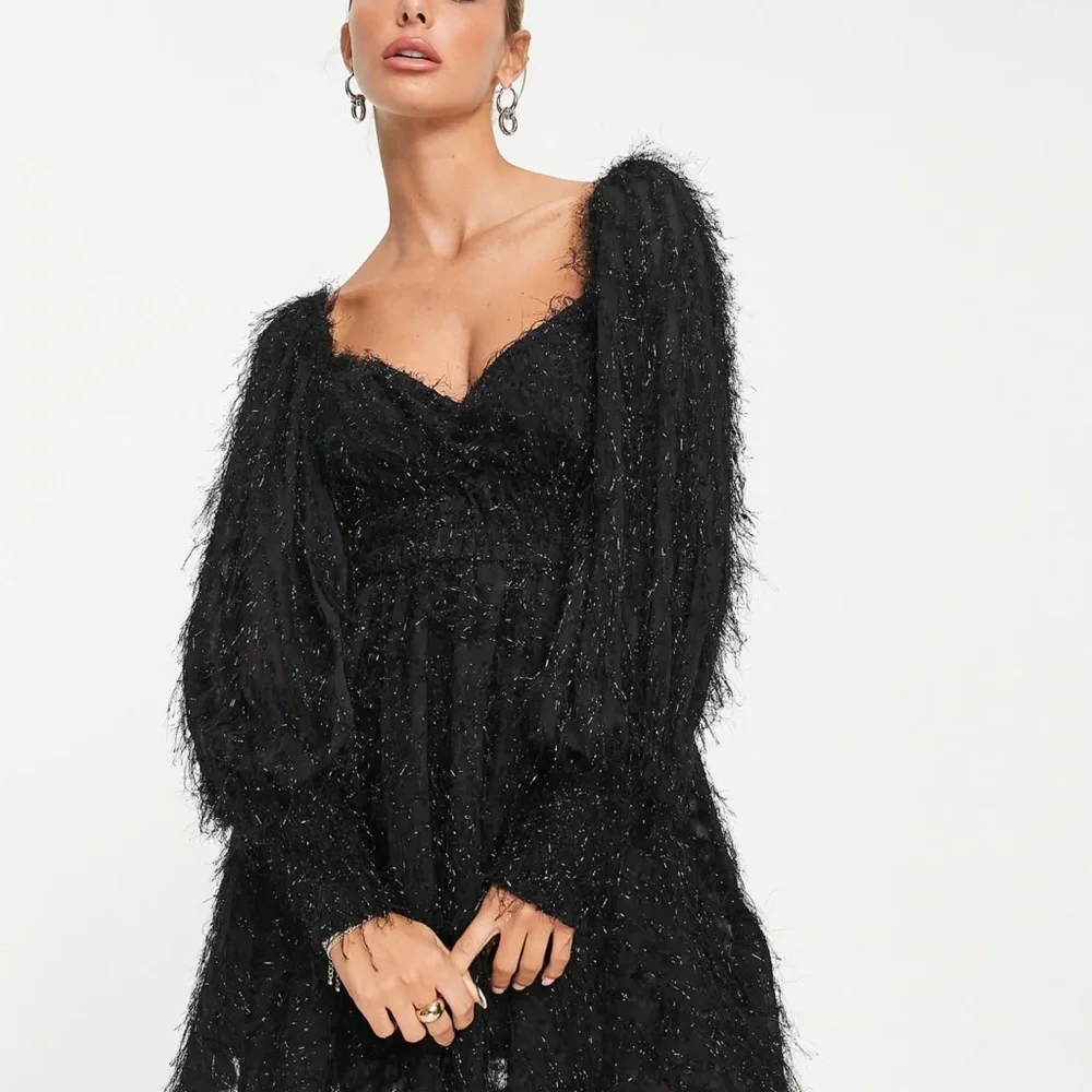 ASOS DESIGN fluffy mini dress with ruched bust and shirred cuffs in black - Picture 7 of 8